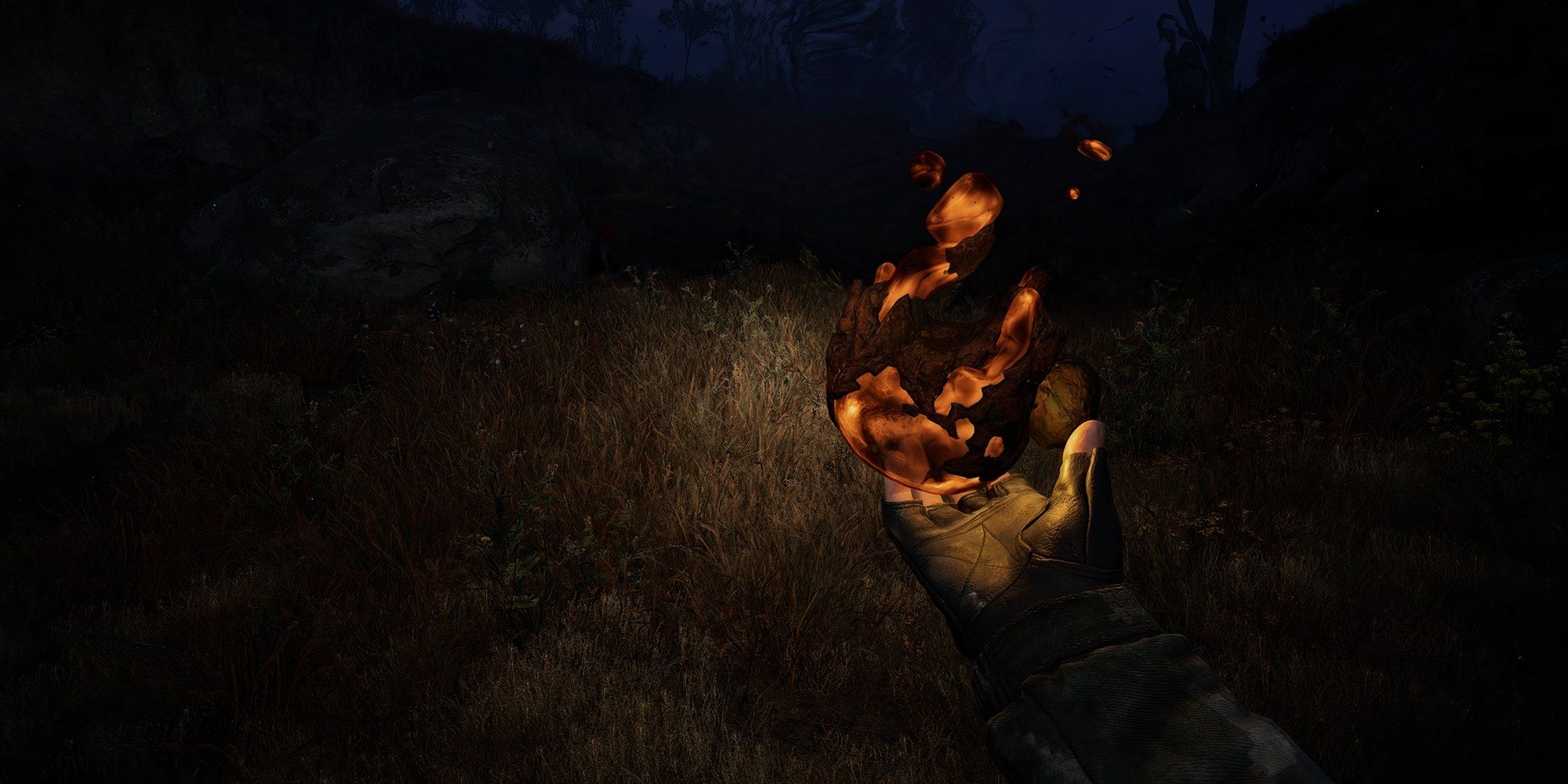 Stalker 2 protagonist holding an artifact