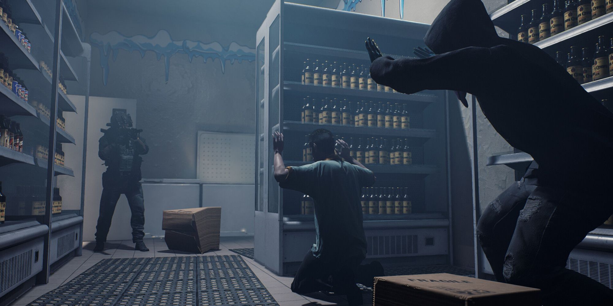 An official image of an officer and two surrendering suspects.