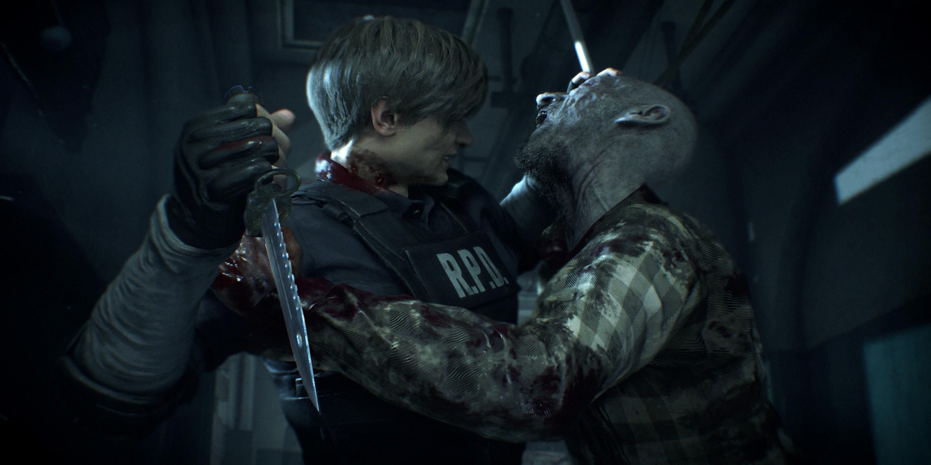 Leon Kennedy being grabbed by a zombie in Resident Evil 2 Remake