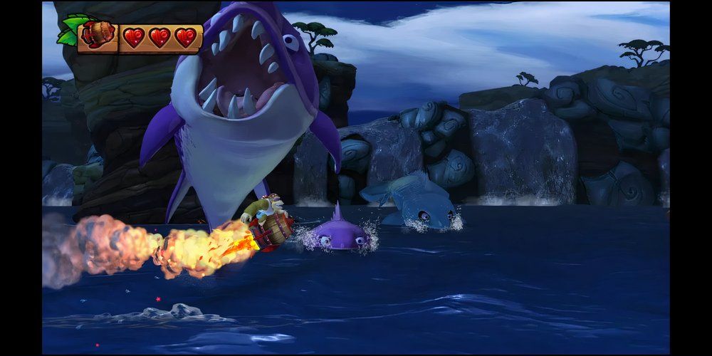 Donkey-Kong-Country-Tropical-Freeze-Funky-Kong-riding-rocket-barrel-with-fish-monster-jumping