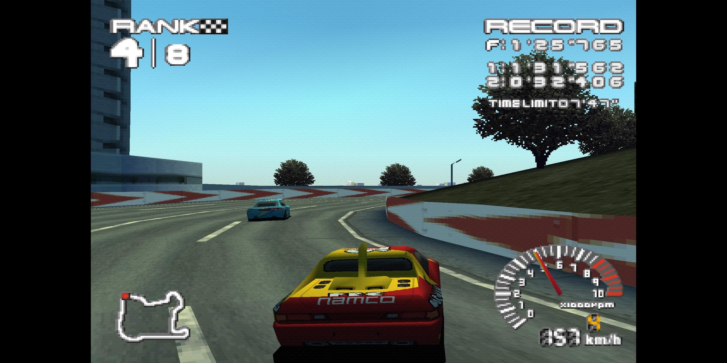Taking a turn in a red and yellow car in Ridge Racer Type 4